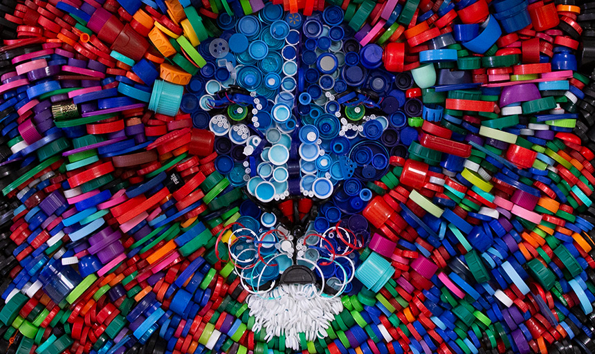 A colorful cascade of plastic bottle caps and rings