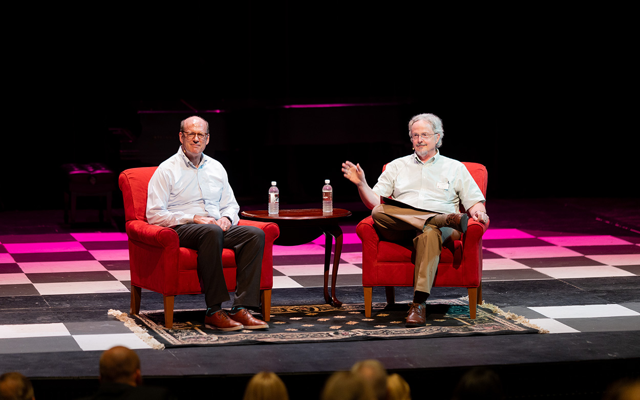 Jonathan Reckford and Professor James Peterson on stage during Thursday's talk at Olin Theater