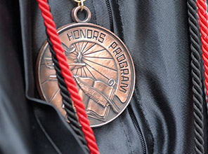 Closeup on an honors program medal