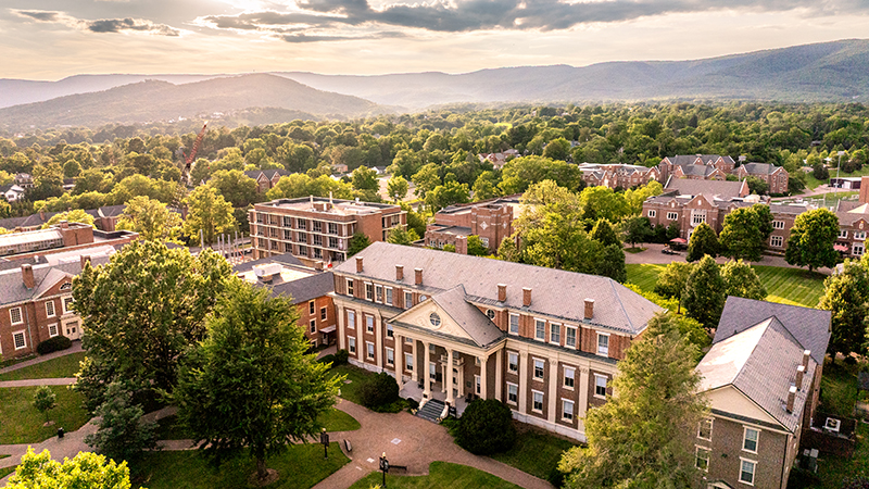Campus from above with mountains beyond