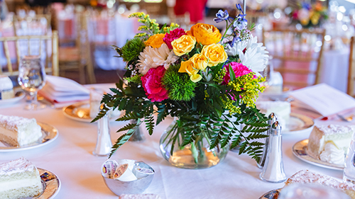 Floral arrangement on a set table
