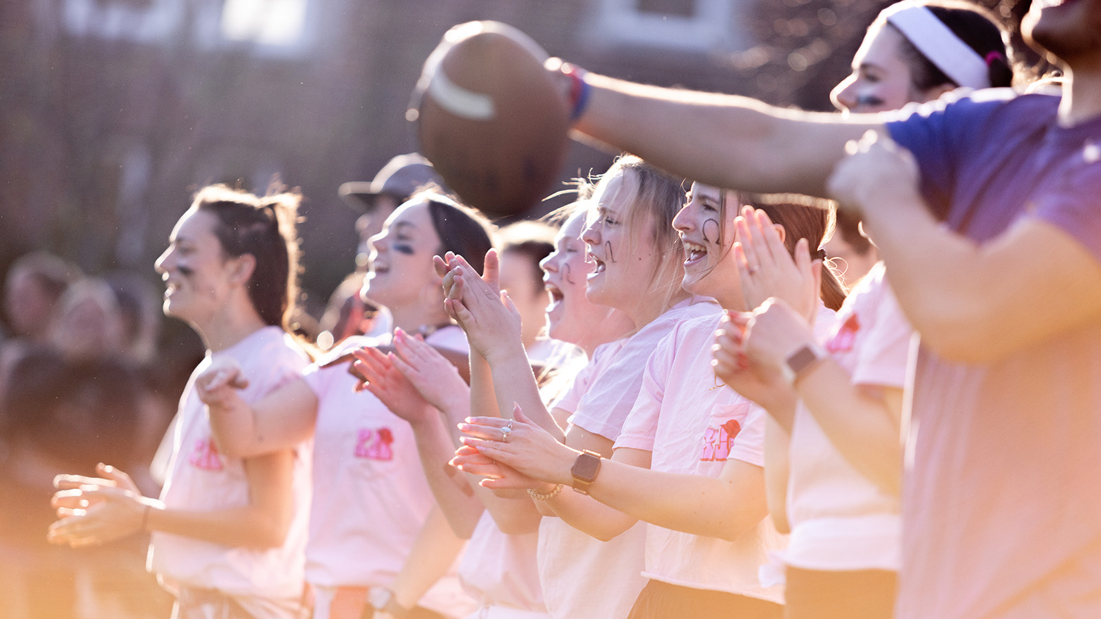 Students play flag football during Greek week.