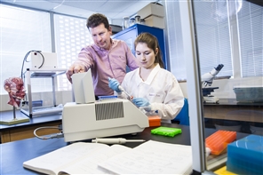 Student working on PCR machine