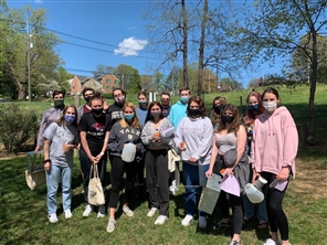 Class standing together outside