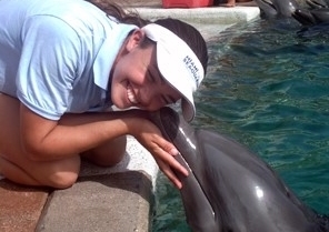 student with a dolphin
