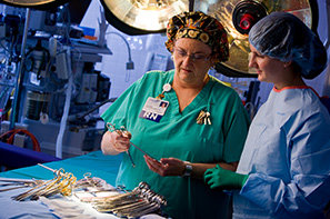 two people in an operating room