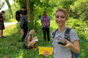 student with turtle