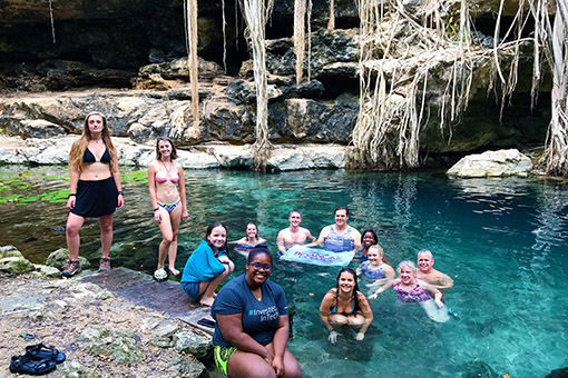 students swimming in the Yucatan