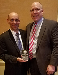 stanley meador accepting an award