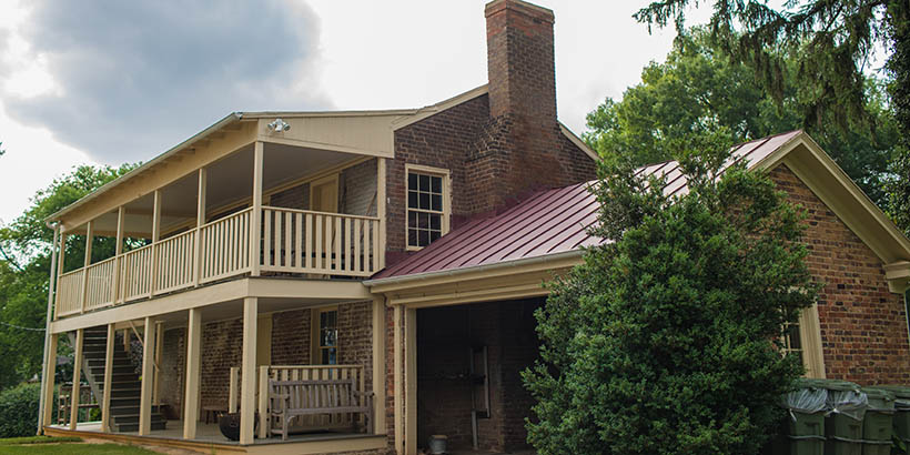 The outside of the Monterey House and renovated slave quarters