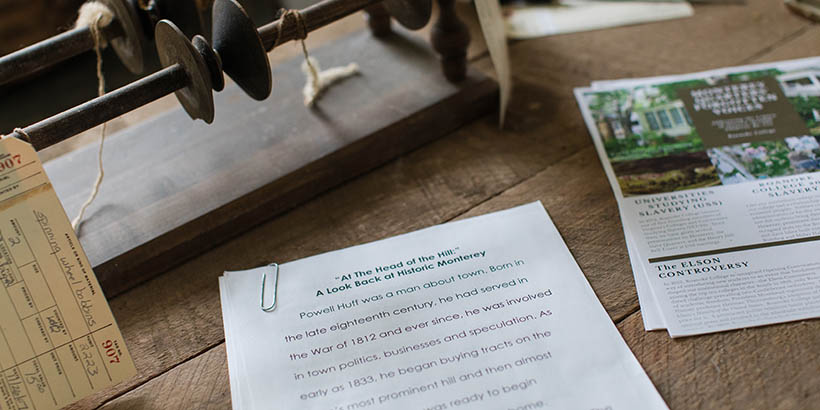 An old letter and other artifacts on a table