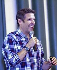 Paul Gorski speaking with a microphone