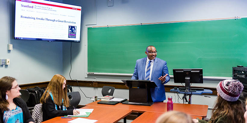 Dr. Brad Braxton speaks to RC students in class