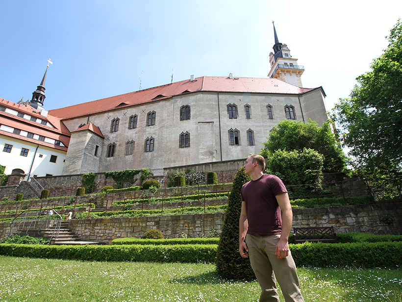 Student infront of a castle