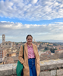 Jenin Perugia eating at an Italian restaurant