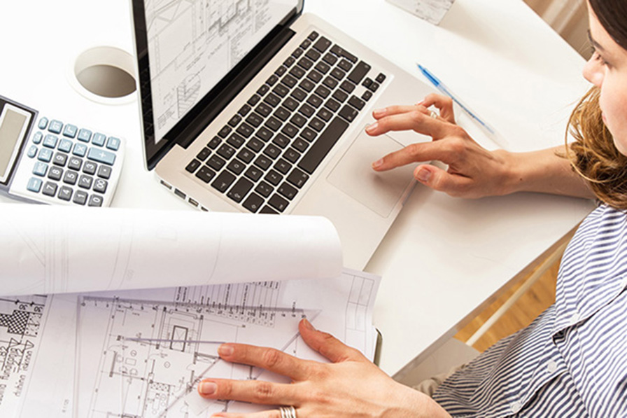 Figure working on computer