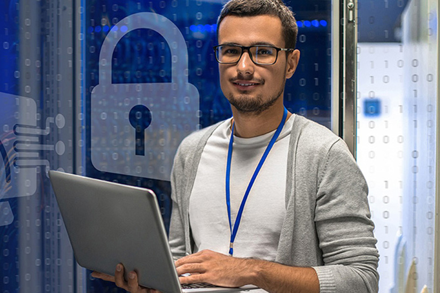 Figure holding laptop