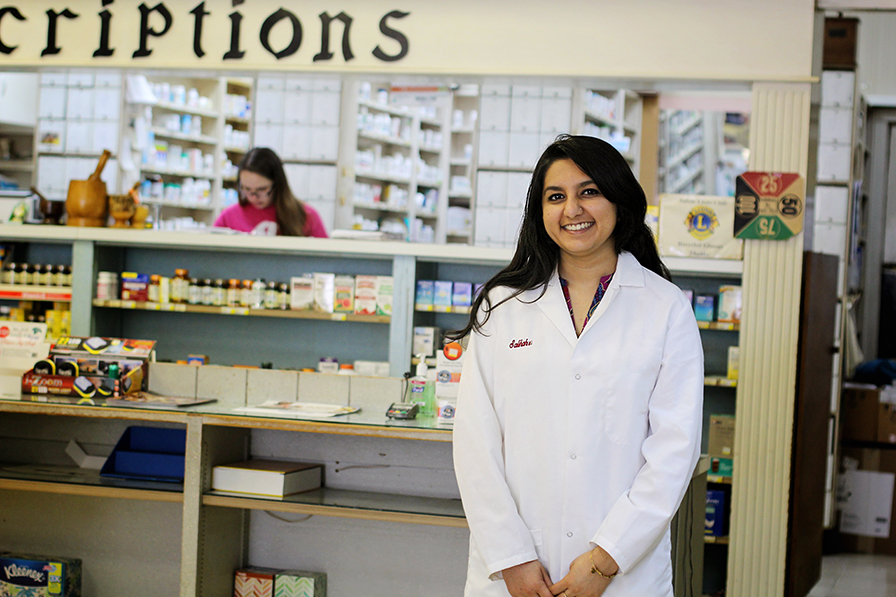 student in a pharmacy
