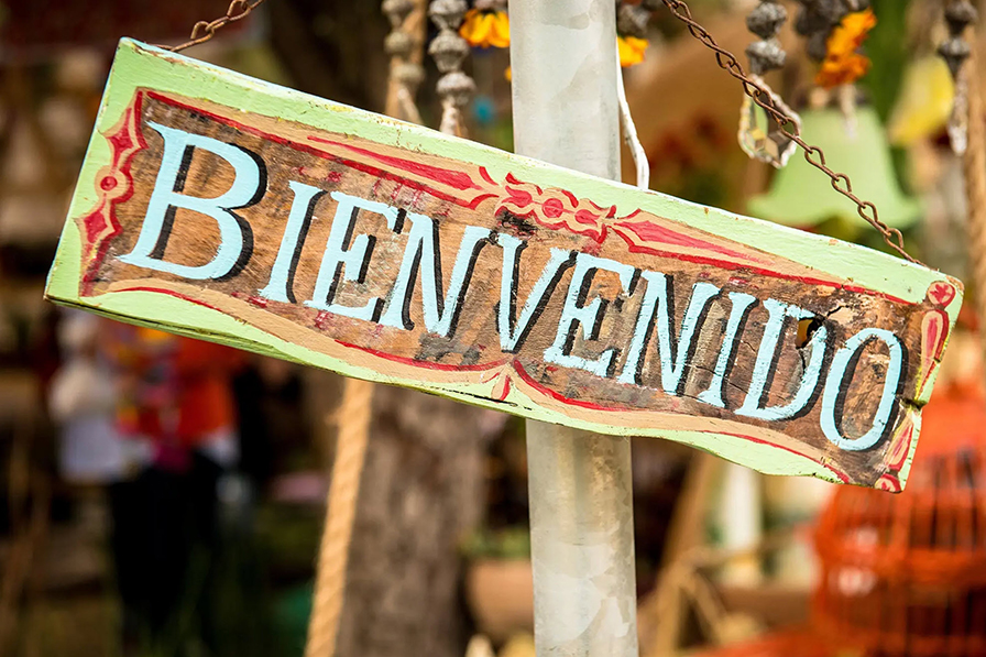 construction worker holding a bag over his shoulder
