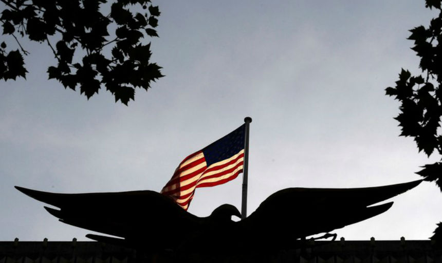 flag and eagle at sunset