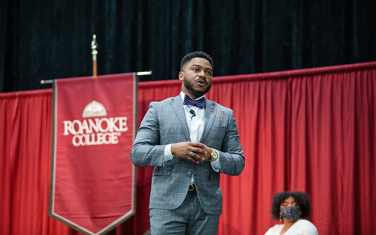 fleming giving lecture on stage