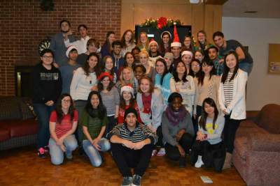 International students gathered together in a lounge for a picture