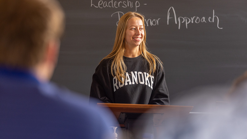 student in class presenting