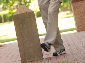 A student kicking the kicking post
