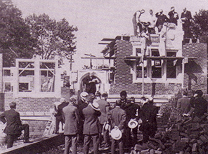 Old photo of construction of a new building on campus