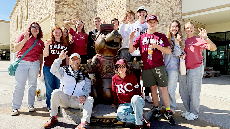 group of students showing the talon hand symbol