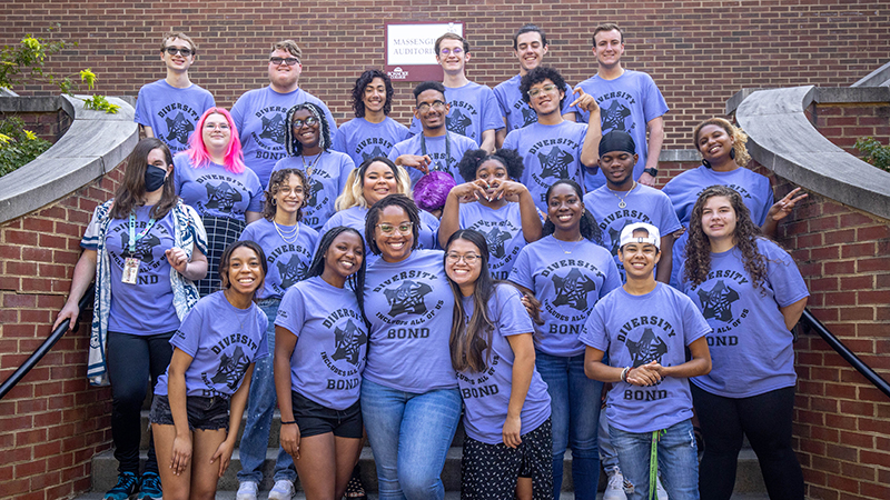 Group of students wearing purple shirts