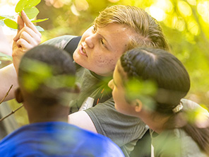 RC student teaching younger children in summer youth camp