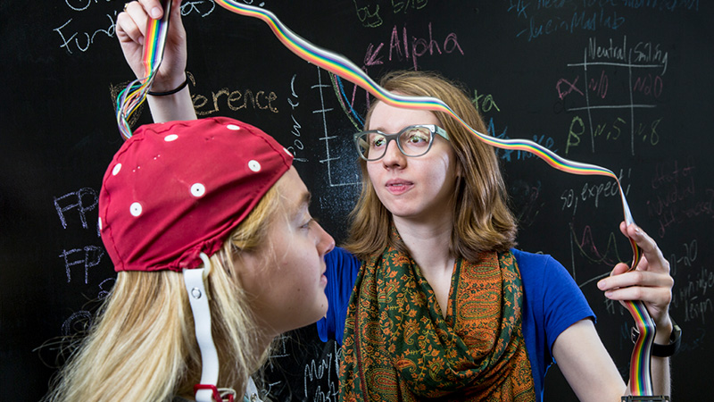 student collecting data from a subject