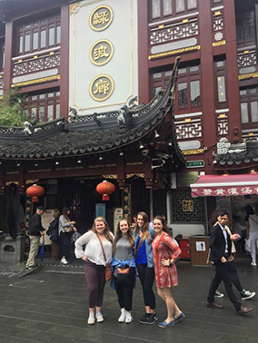 Students in front of a building in China