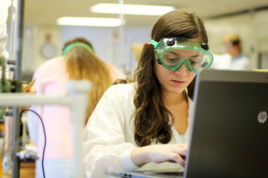 Lab student working at a computer