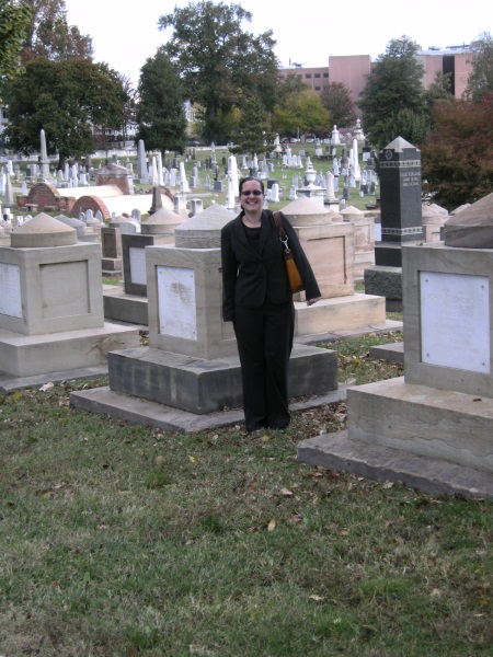 Student, Julia, standing in a cemetery 