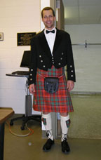 Dr. Richard Grant wearing a kilt