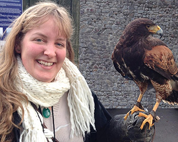 Photo of Dr. Bethany Sollereder with a hawk