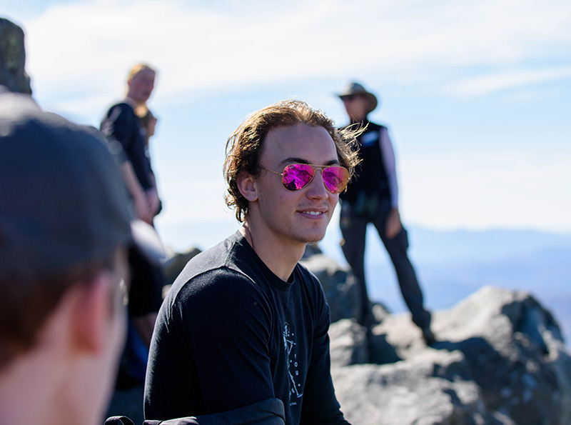 Photo of Davis Tingle wearing sunglasses and smiling