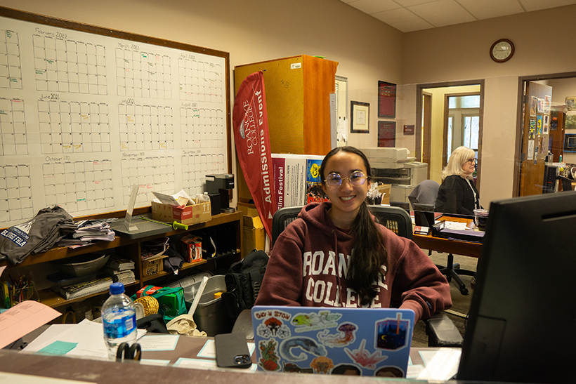 Student working in an office