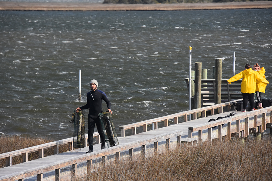 student in wetsuit