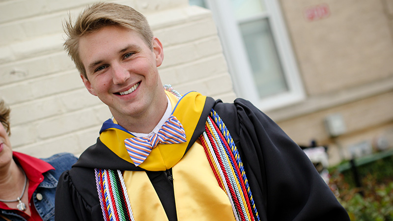 Cooper Tyree '15 in his graduation robe