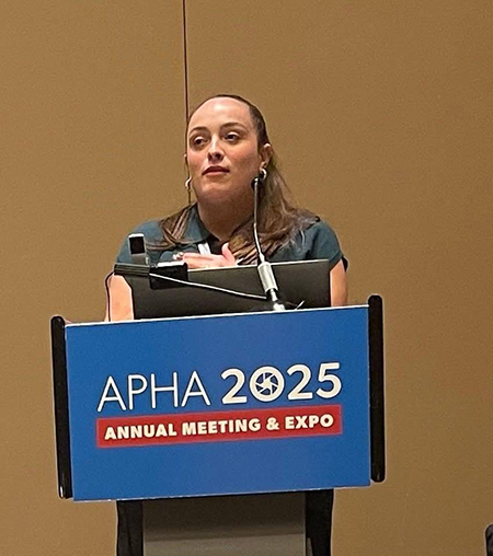 Adeline presents at a conference