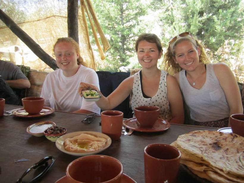 Students eating israeli food