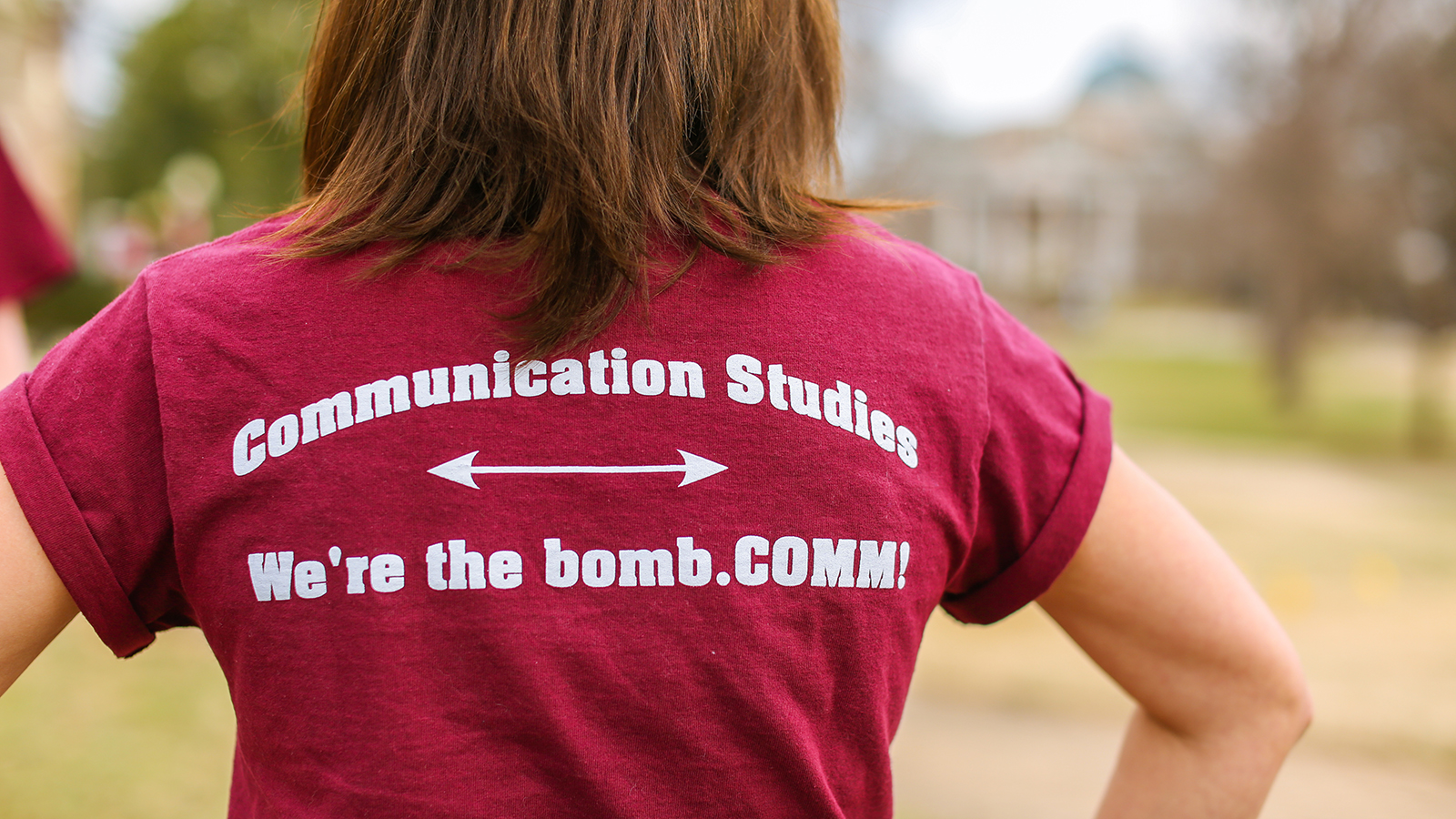 Communications studies shirt reading "the bomb.com" 