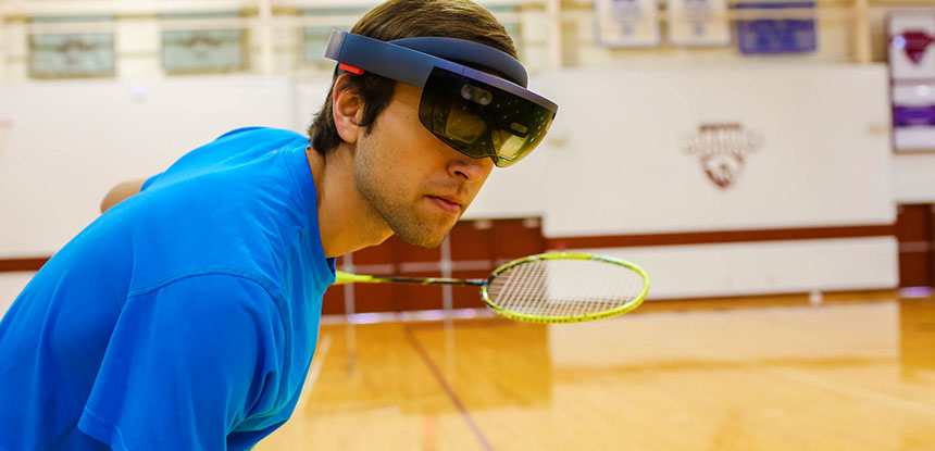 student on athletic court wearing googles
