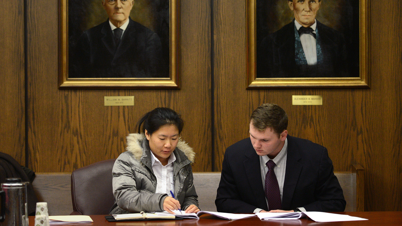 Students sitting in a courtroom for a mock trial