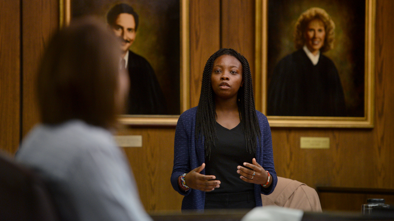 student speaking in a court room