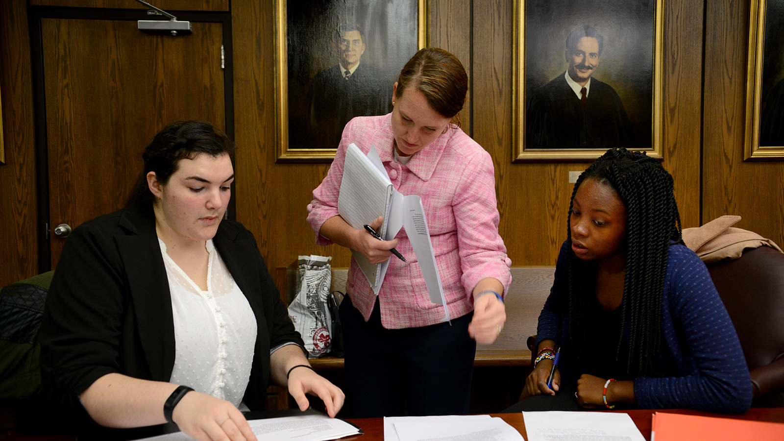 Student speaking in a courtroom