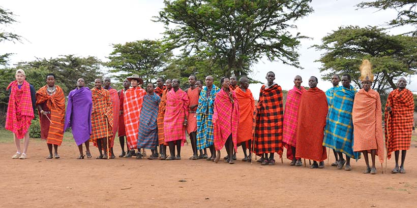 Students with the masai mara in Kenya
